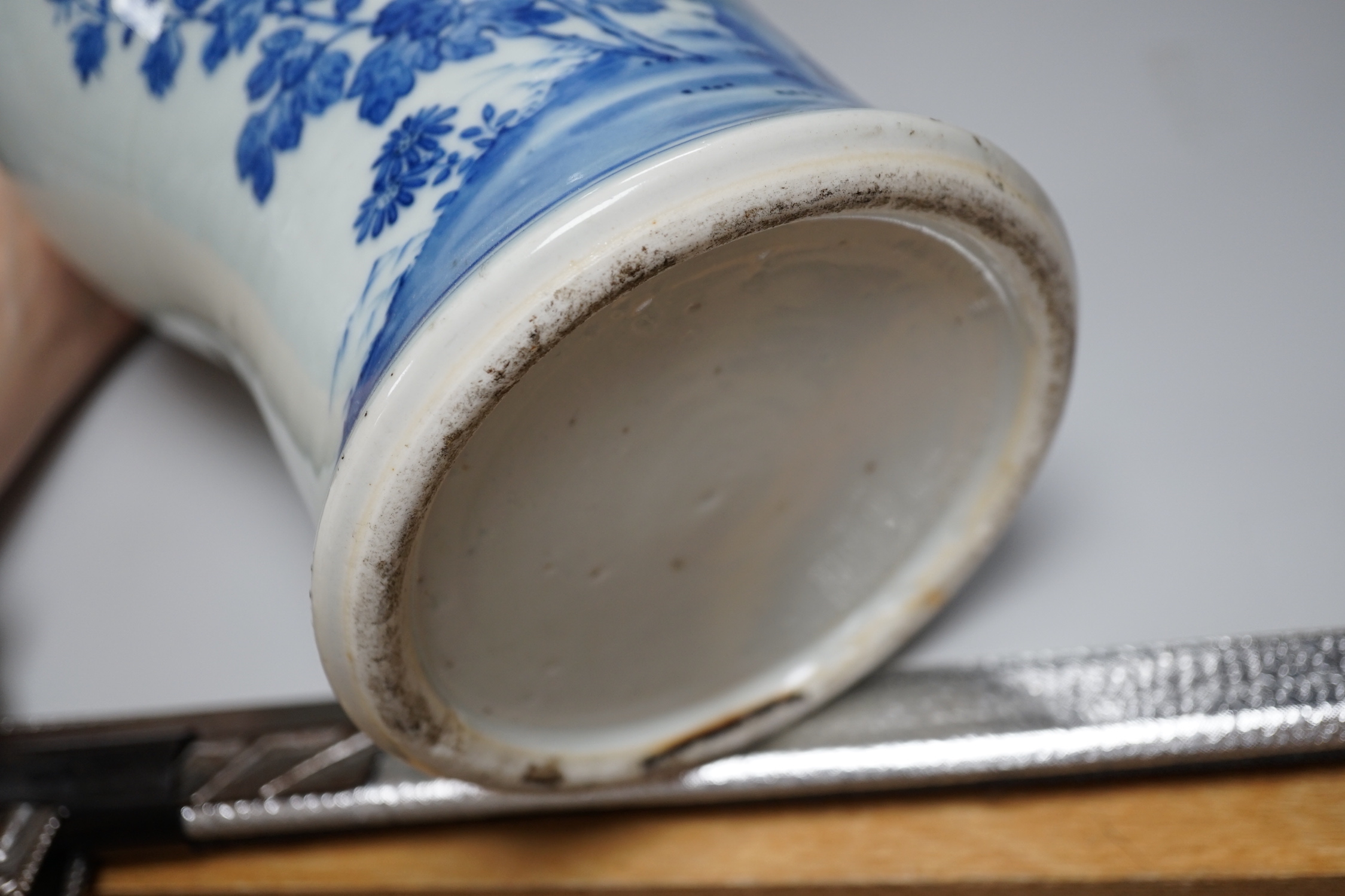 A pair of Chinese Canton decorated famille rose enamelled vases, 36cm high, an early 20th century Chinese blue and white baluster vase, 25cm (a.f.), a 19th century Chinese blue and white gu shaped vase, 37.5cm (a.f.), a